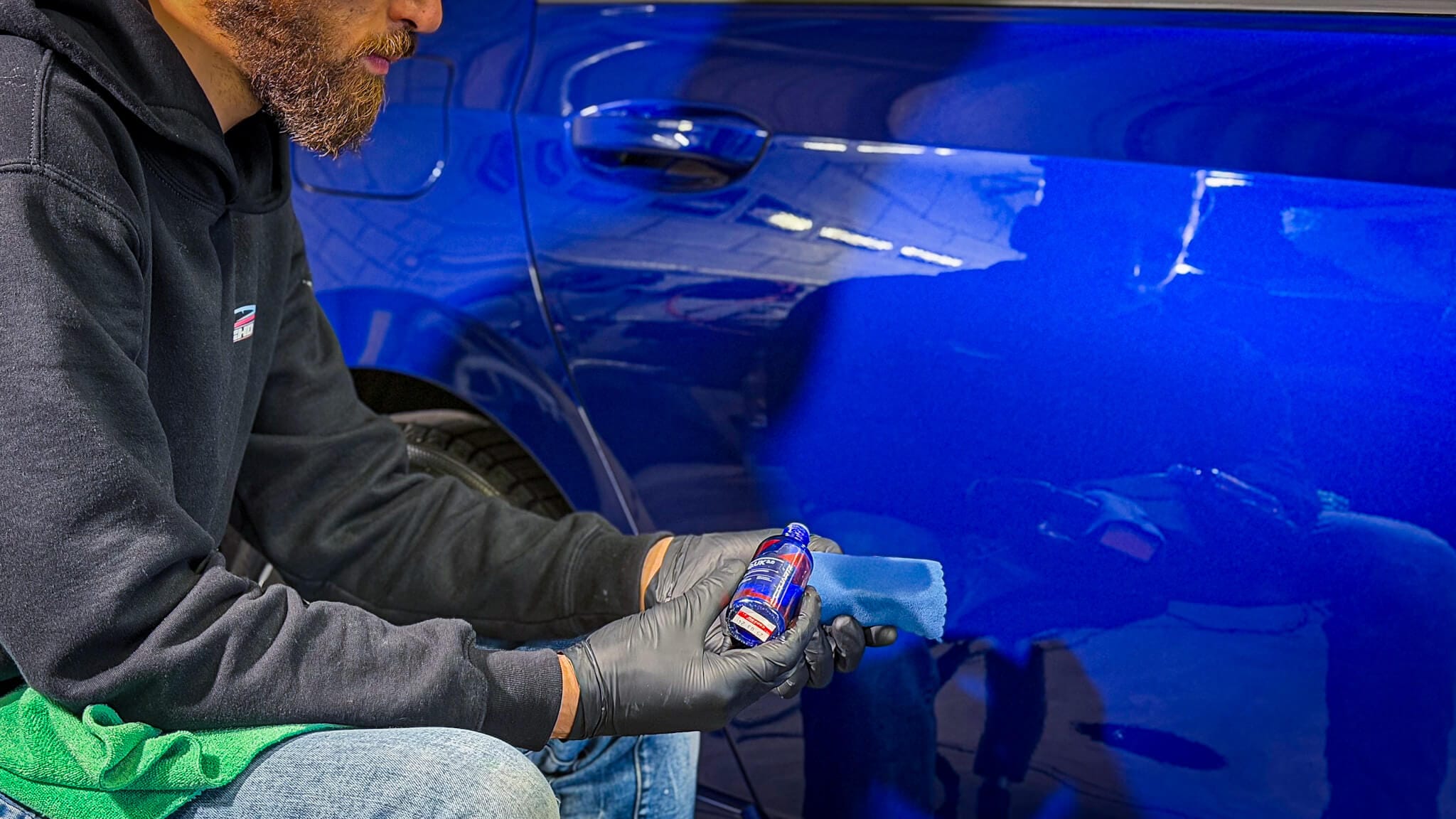 Ceramic coating application on a vehicle at Psycho Detailing in Terrebonne, Quebec