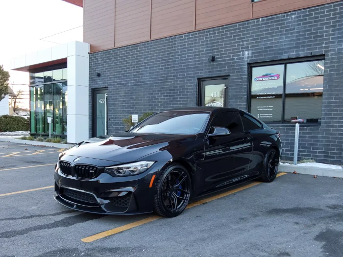 Ceramic coated car exterior displaying a smooth and glossy finish in natural light