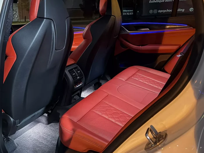 Fully detailed car exterior showing a clean and glossy finish after full detailing