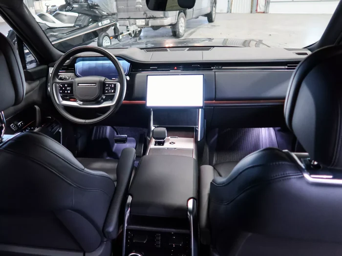 Clean car interior after professional interior detailing with seats and dashboard restored